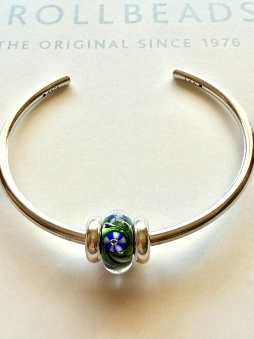 Trollbead OOAK Unique Small Bead. White & Blue Circles on Green Waves below.
